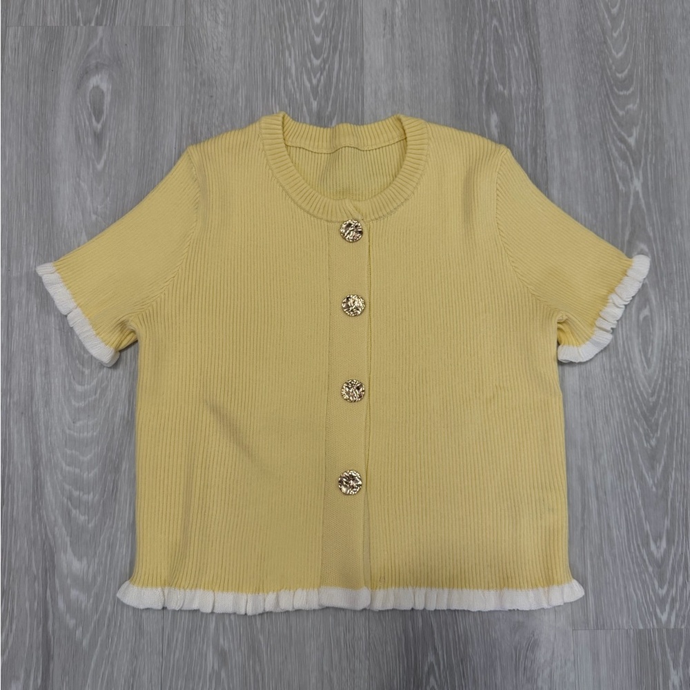 yellow sweater